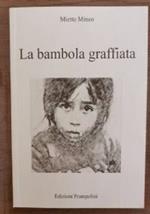 La bambola graffiata