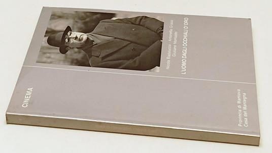 L' Uomo Dagli Occhiali D'Oro - copertina