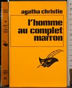L' homme au complet marron