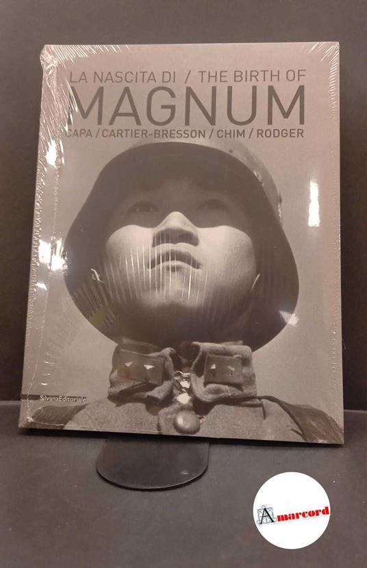 Minuz, Marco. La nascita di Magnum : Robert Capa, Henri Cartier-Bresson, George Rodger, David 'Chim' Seymour. Cinisello Balsamo (Mi) SilvanaEditoriale, 2014 - copertina