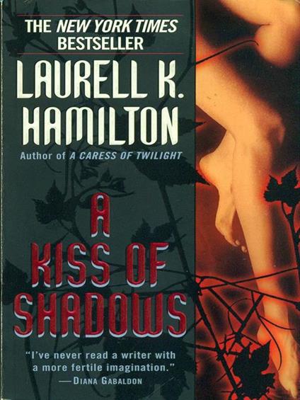 A kiss of shadows - Laurell K. Hamilton - copertina