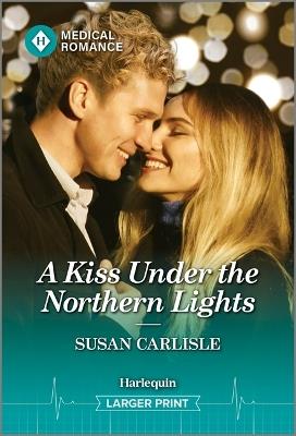A Kiss Under the Northern Lights - Susan Carlisle - cover