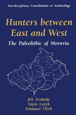 Hunters between East and West: The Paleolithic of Moravia - Jiri Svoboda,Vojen Lozek,Emanuel Vlcek - cover