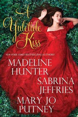 A Yuletide Kiss - Madeline Hunter,Sabrina Jeffries - cover
