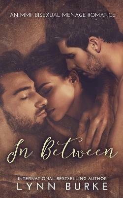 In Between: A Steamy MMF Bisexual Menage Romance - Lynn Burke - cover