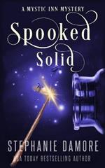 Spooked Solid: A Paranormal Cozy Mystery
