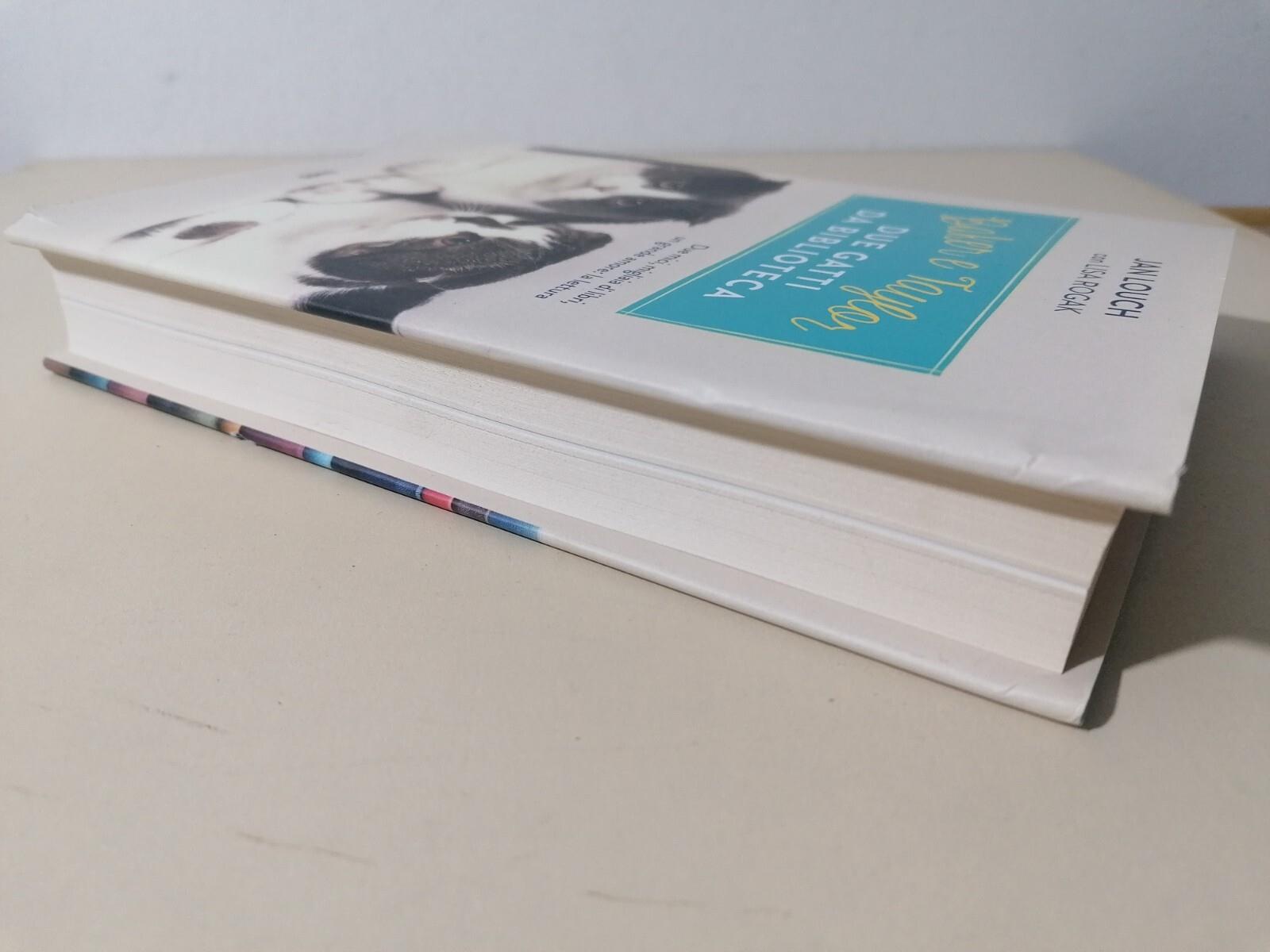 Baker & Taylor, due gatti da biblioteca