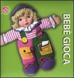 Bebè gioca