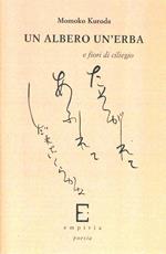 Un albero un'erba e fiori di ciliegio